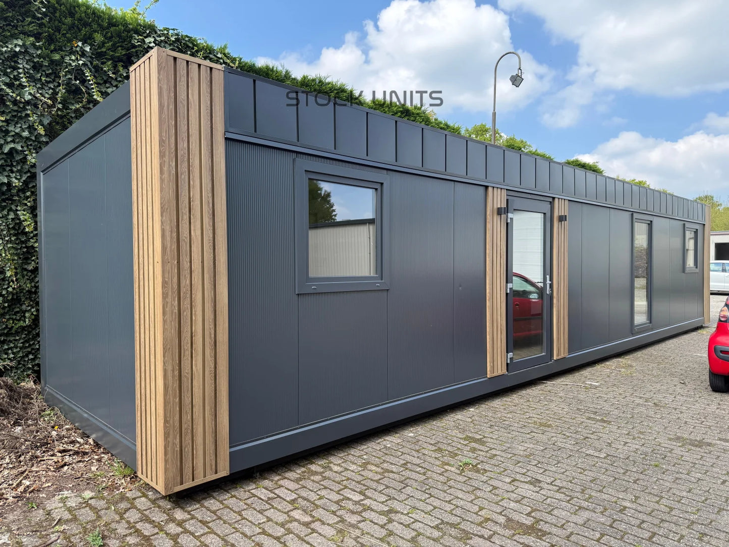 Containerwoning 13x3,2m 42m2 - 1 slaapkamer