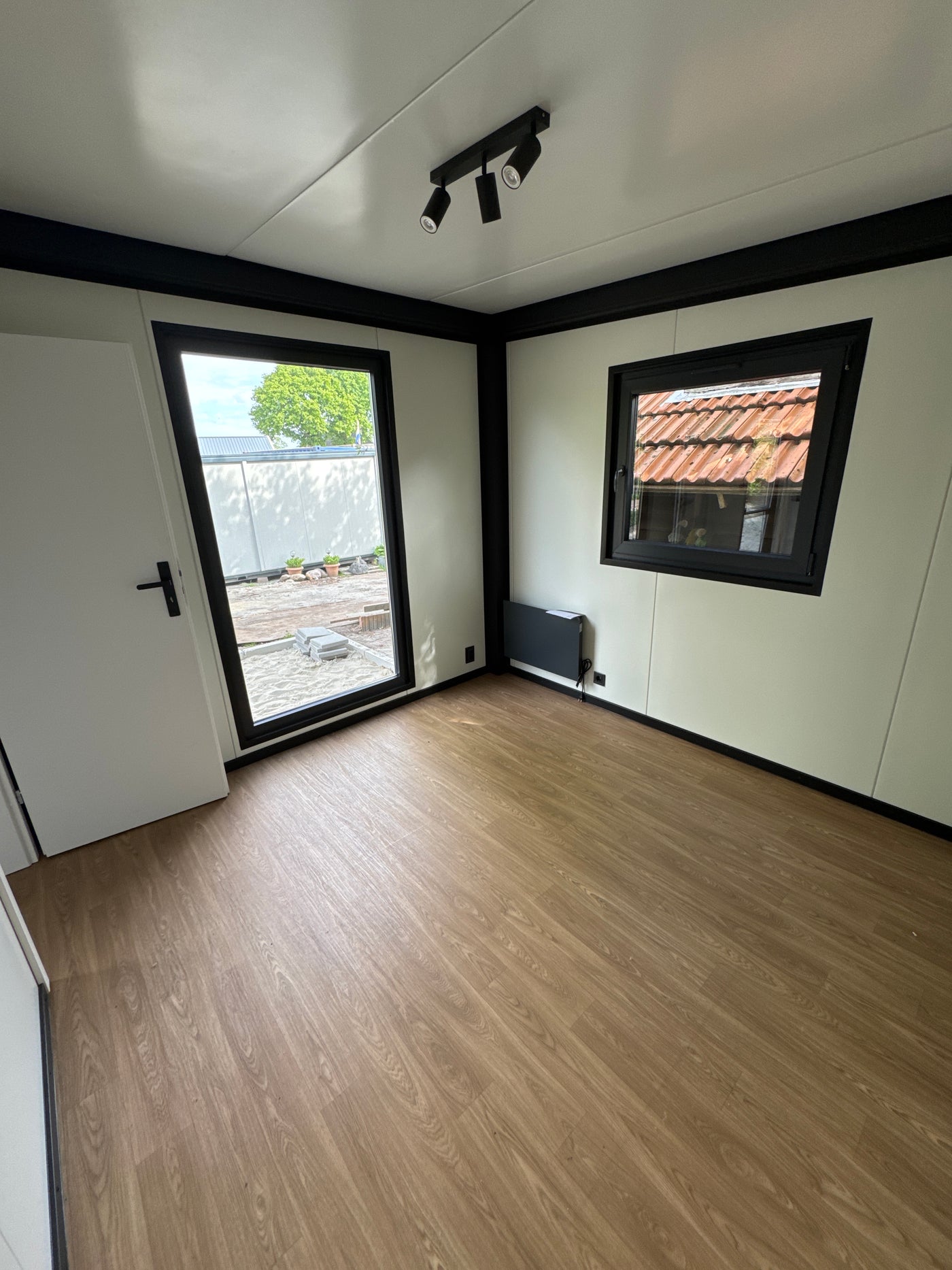 Woonunit van 13 × 3,2 meter in Daarlerveen voor Gemeente Hellendoorn