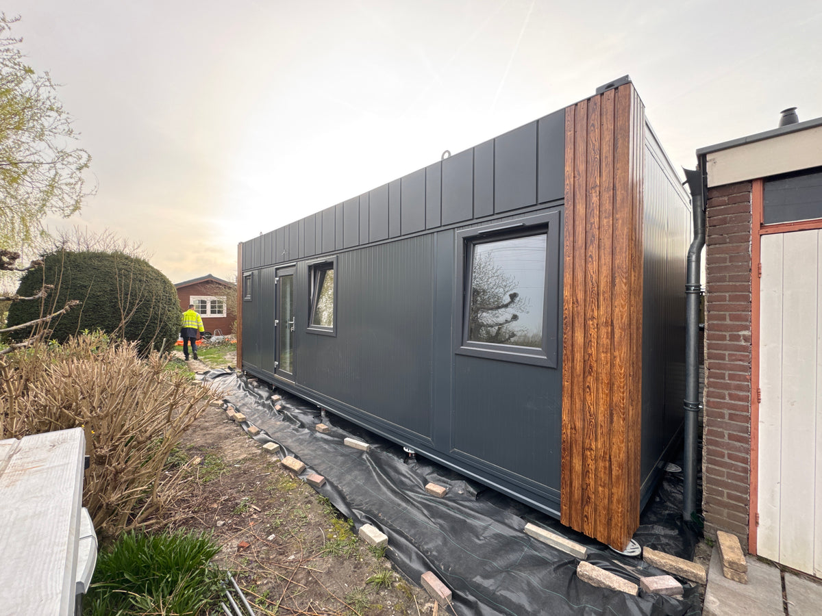Gerealiseerde woonunit van 8 × 3,2 meter in Beinsdorp met slaapkamer, keuken en badkamer