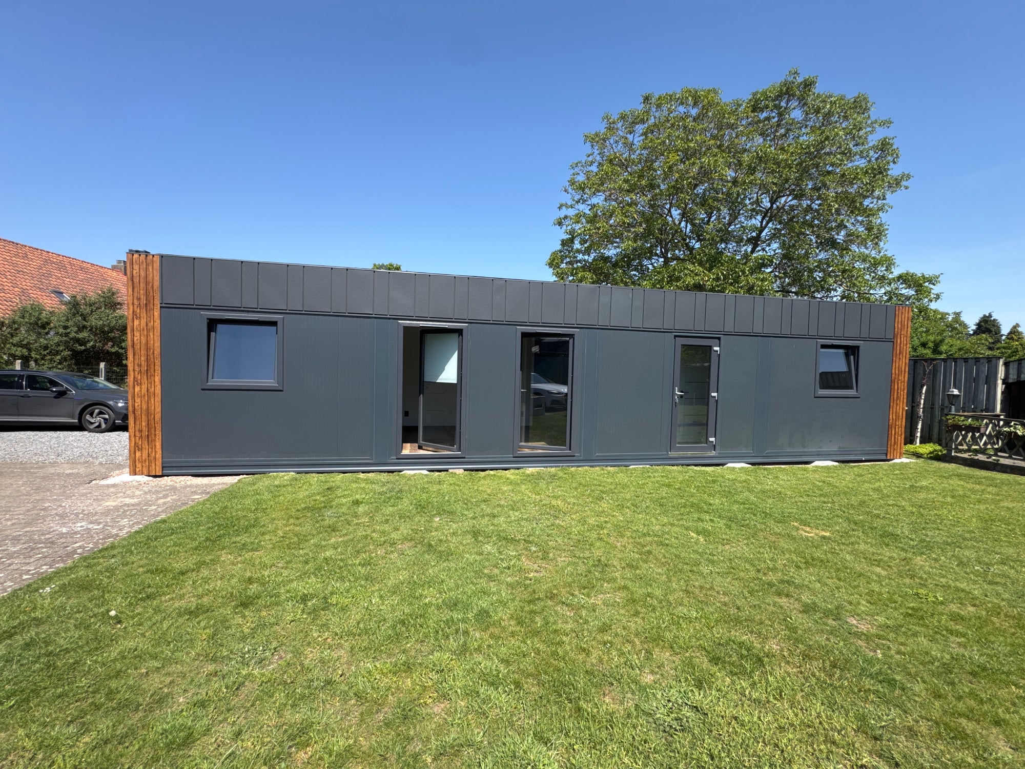 Woonunit van 13 × 3,2 meter geplaatst in Oudsbergen