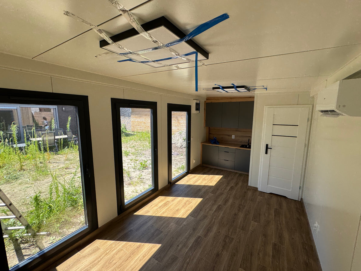 Poolhouse van 6 × 3,2 meter met houten gevel in Teteringen