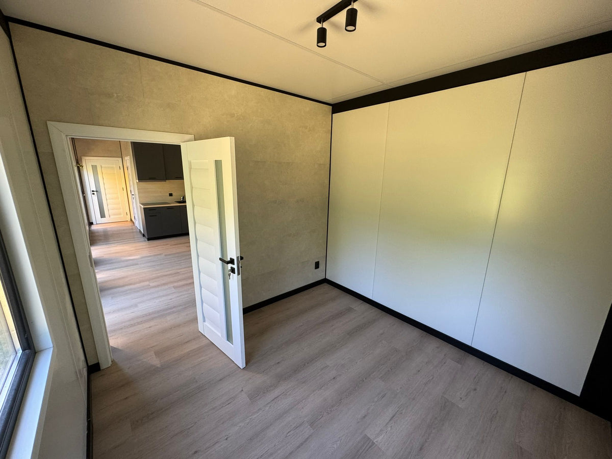 Mantelzorgwoning van 13 × 3,2 meter in Prinsenbeek