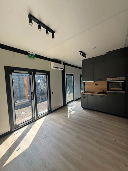Woonunit 13,5x3,2m RO (SNF normering) - 2 slaapkamers