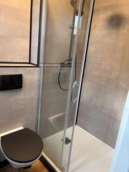 Tweedehands woonunit 26m² (8x3,2m) - 1 slaapkamer (rechts) - RO